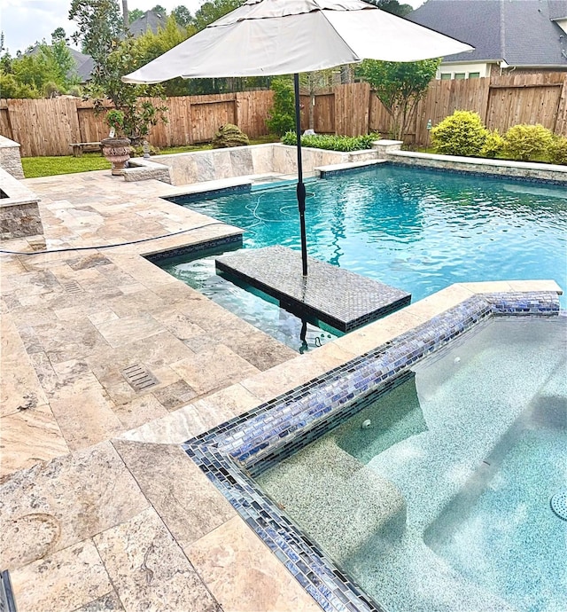 34315 E Short Leaf Pine Ct, Pinehurst, TX 77362 - view of pool featuring a patio area, an in ground hot tub, a fenced in pool, and a fenced backyard