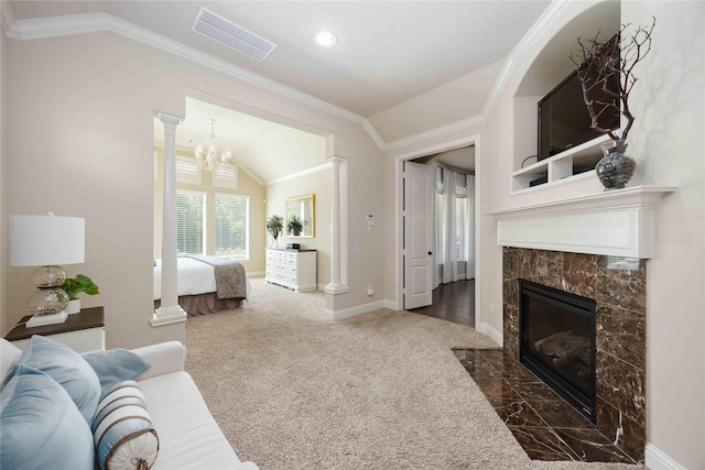 21207 Fairhaven Creek Dr, Cypress, TX 77433 - living area featuring dark colored carpet, visible vents, lofted ceiling, a premium fireplace, and ornamental molding