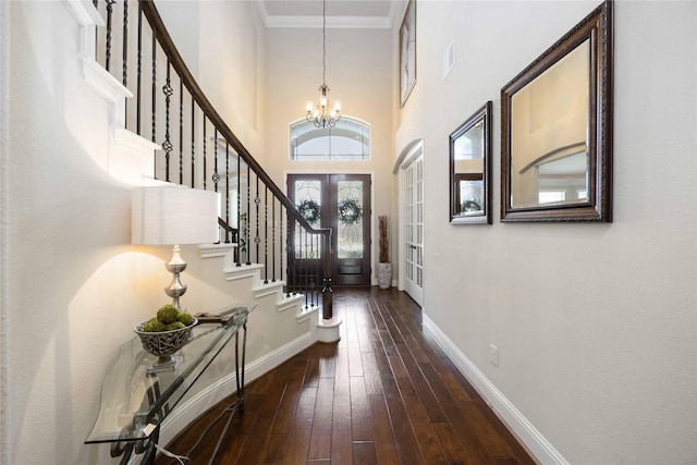 21207 Fairhaven Creek Dr, Cypress, TX 77433 - entrance foyer with dark wood-style flooring, visible vents, baseboards, a notable chandelier, and stairway