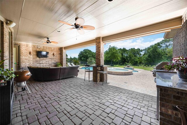 21207 Fairhaven Creek Dr, Cypress, TX 77433 - view of patio featuring an outdoor living space, ceiling fan, a pool with connected hot tub, and a grill