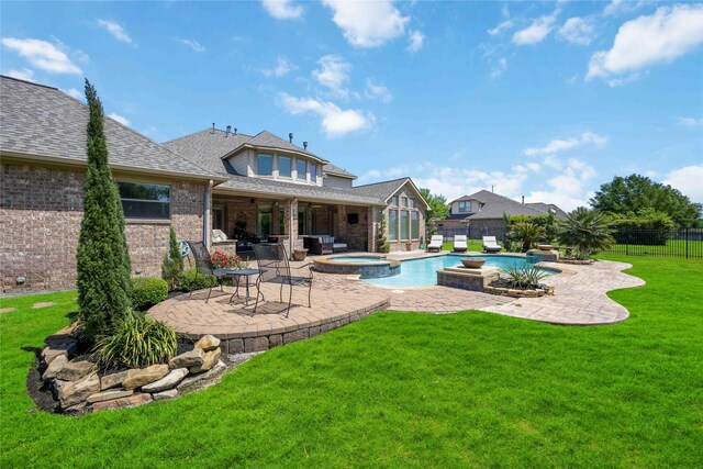 21207 Fairhaven Creek Dr, Cypress, TX 77433 - view of pool featuring a fenced backyard, a patio area, a lawn, and a pool with connected hot tub