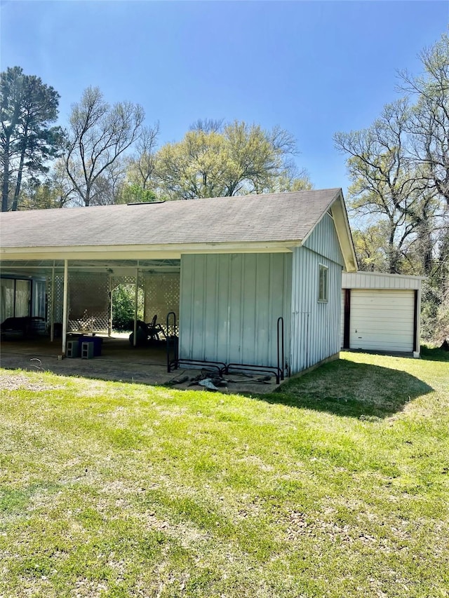 404 N Grace St, Crockett, TX 75835 - view of property exterior with board and batten siding, a lawn, and a shingled roof
