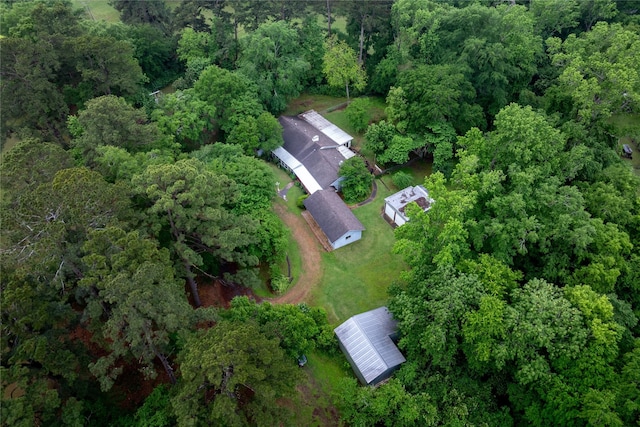aerial view featuring a view of trees
