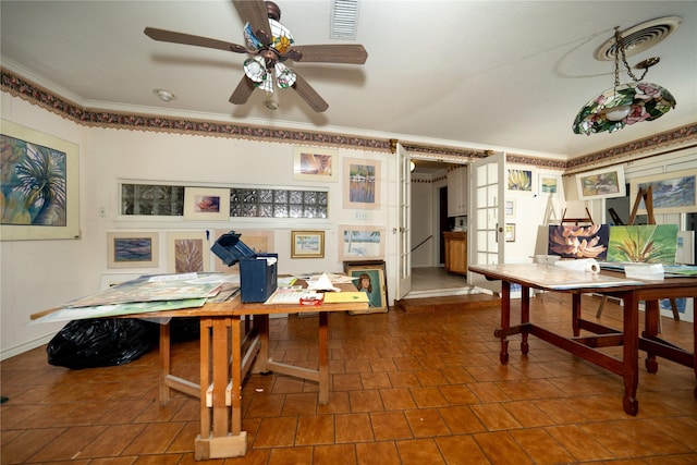 office with visible vents, french doors, crown molding, and a ceiling fan
