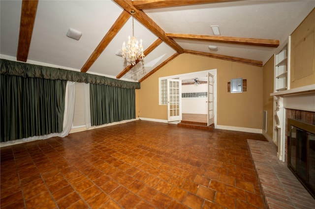 404 N Grace St, Crockett, TX 75835 - unfurnished living room with a fireplace, ceiling fan, and a chandelier