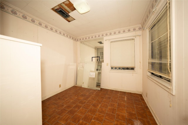 404 N Grace St, Crockett, TX 75835 - spare room featuring brick patterned floors