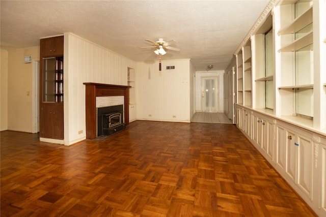 404 N Grace St, Crockett, TX 75835 - unfurnished living room with ceiling fan and a textured ceiling