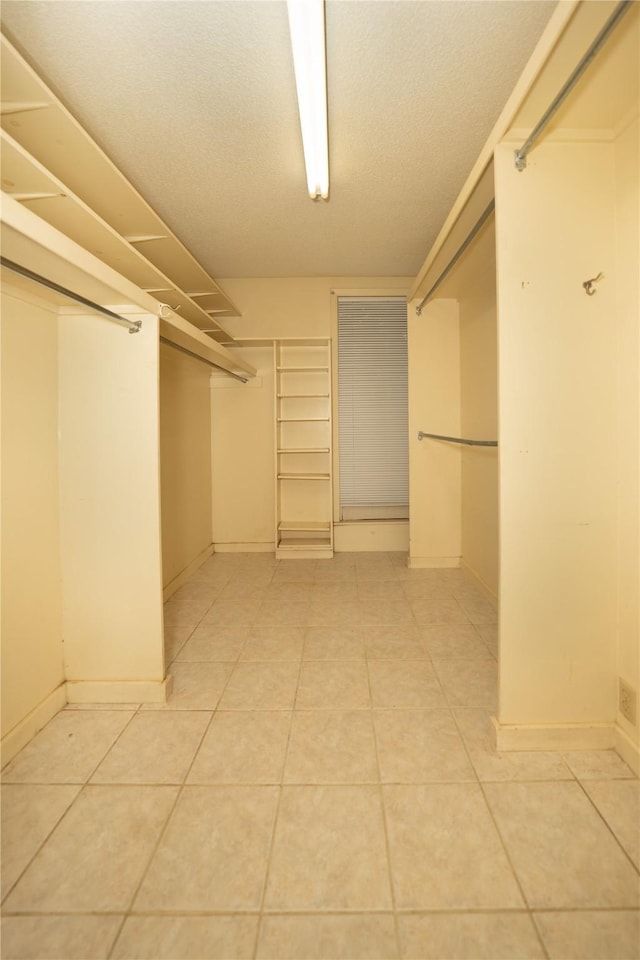 404 N Grace St, Crockett, TX 75835 - spacious closet with light tile patterned floors
