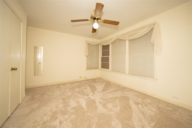 404 N Grace St, Crockett, TX 75835 - empty room featuring carpet and a ceiling fan