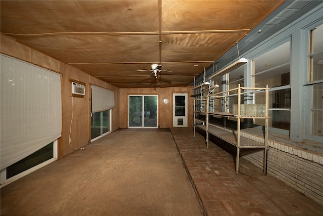 404 N Grace St, Crockett, TX 75835 - unfurnished sunroom featuring a wall mounted AC