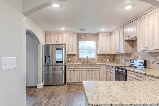 1189 Fm 935, Lott, TX 76656 - kitchen with a sink, backsplash, visible vents, and stainless steel appliances