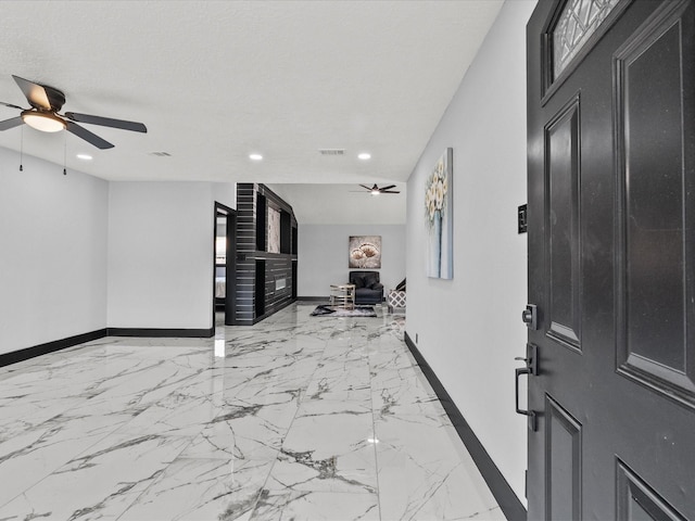 11506 Kirkhollow Dr, Houston, TX 77089 - entrance foyer featuring baseboards, a ceiling fan, recessed lighting, and light marble finish flooring