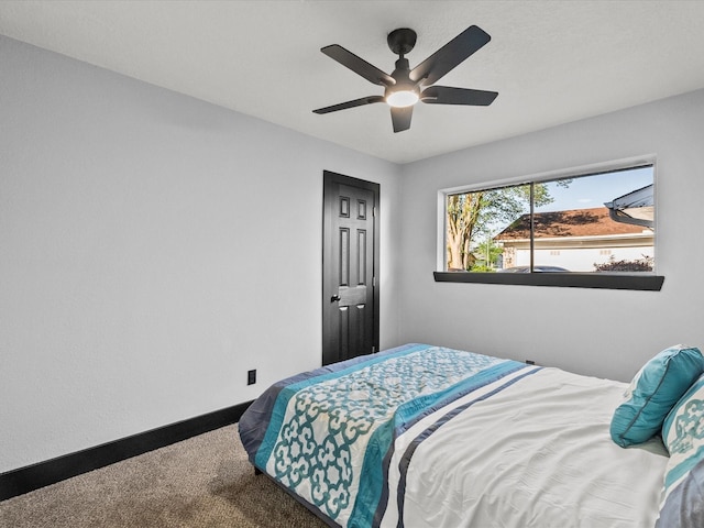 11506 Kirkhollow Dr, Houston, TX 77089 - carpeted bedroom with baseboards and ceiling fan