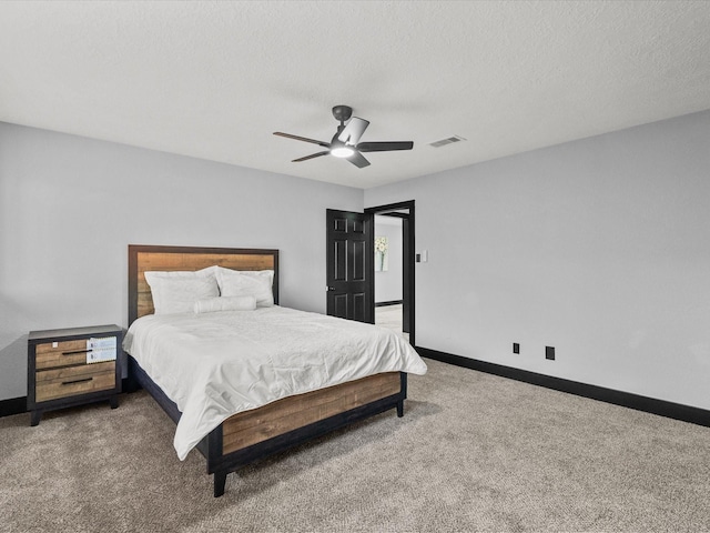 11506 Kirkhollow Dr, Houston, TX 77089 - bedroom featuring carpet floors, baseboards, a textured ceiling, and ceiling fan