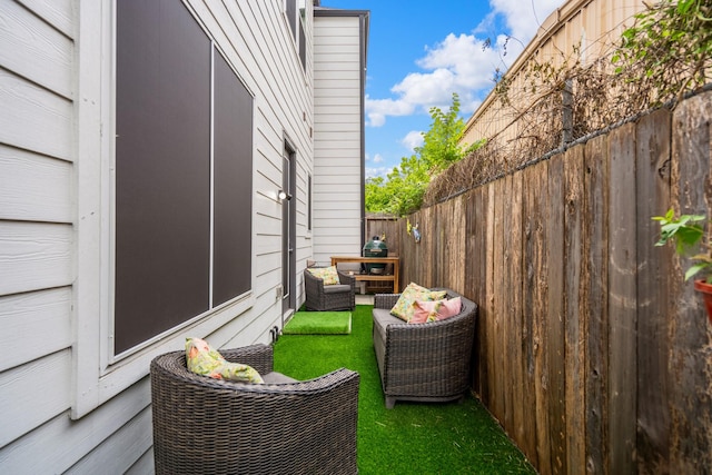 view of home's exterior featuring fence