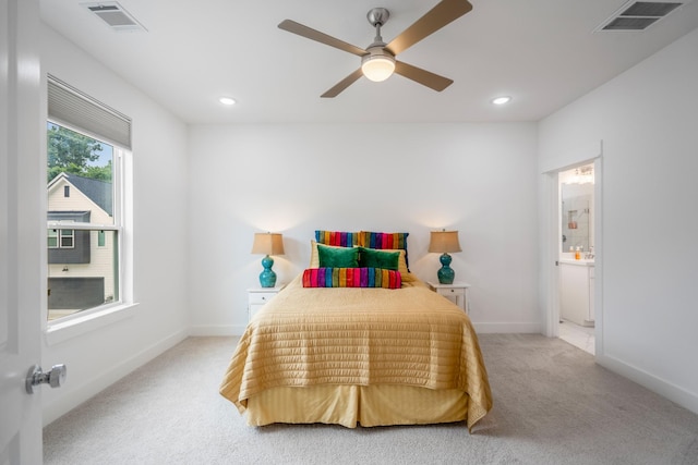 bedroom featuring visible vents, recessed lighting, and light colored carpet