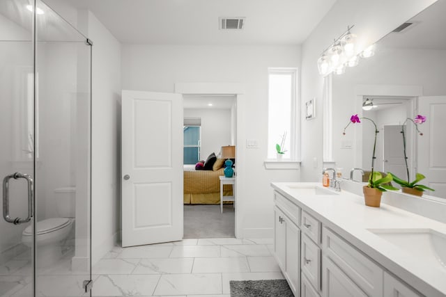 bathroom with marble finish floor, visible vents, a sink, ensuite bath, and baseboards
