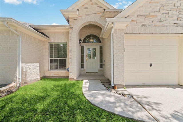 8122 Dune Brook Dr, Pearland, TX 77089 - property entrance featuring a garage, brick siding, and driveway