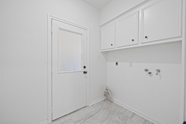 4731 N Cashel Cir, Houston, TX 77069 - washroom with cabinet space, baseboards, electric dryer hookup, and washer hookup