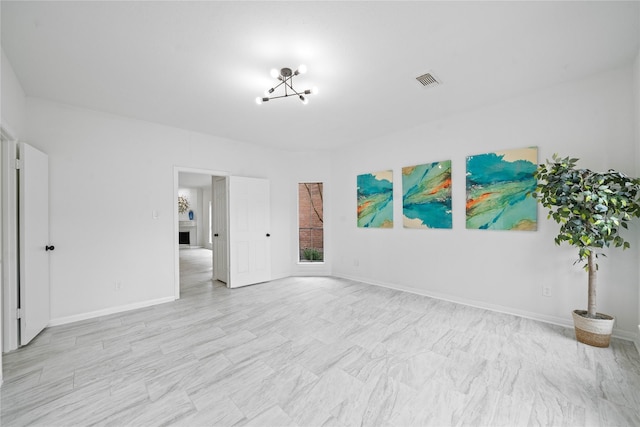 4731 N Cashel Cir, Houston, TX 77069 - spare room featuring an inviting chandelier, baseboards, and visible vents