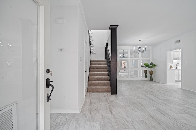 4731 N Cashel Cir, Houston, TX 77069 - foyer with visible vents, baseboards, a notable chandelier, ornamental molding, and stairs