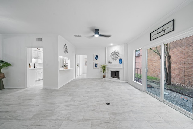 4731 N Cashel Cir, Houston, TX 77069 - unfurnished living room featuring crown molding, visible vents, ceiling fan, and marble finish floor