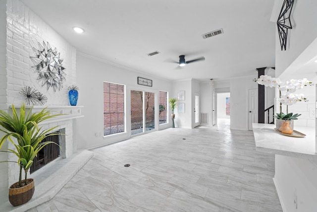 4731 N Cashel Cir, Houston, TX 77069 - unfurnished living room with ceiling fan, a fireplace with raised hearth, visible vents, and stairs