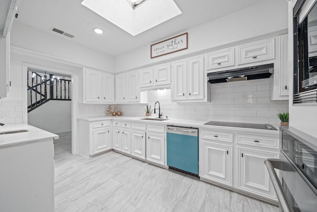 4731 N Cashel Cir, Houston, TX 77069 - kitchen with dishwashing machine, visible vents, a skylight, under cabinet range hood, and a sink