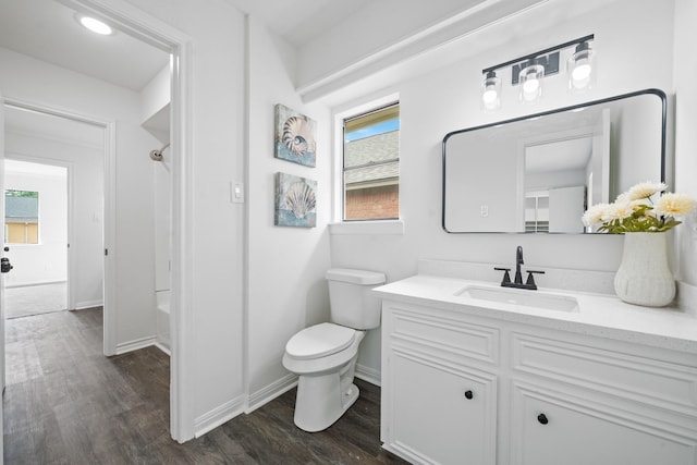 4731 N Cashel Cir, Houston, TX 77069 - bathroom with vanity, baseboards, toilet, and wood finished floors