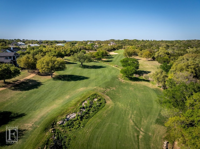 bird's eye view with view of golf course