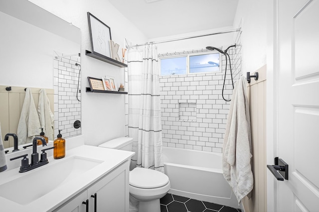 full bath featuring toilet, vanity, shower / bath combination with curtain, and tile patterned flooring