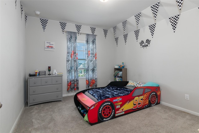 2736 Ahnya Ln, League City, TX 77573 - bedroom with carpet flooring and baseboards