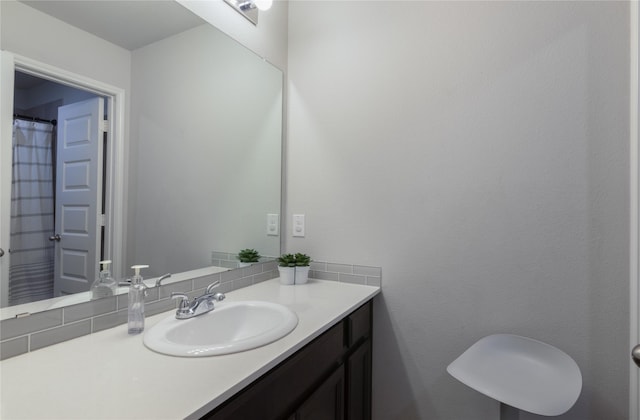 2736 Ahnya Ln, League City, TX 77573 - full bathroom featuring vanity and tasteful backsplash