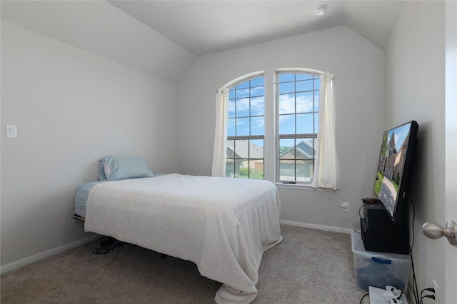 2736 Ahnya Ln, League City, TX 77573 - bedroom with lofted ceiling, light carpet, and baseboards
