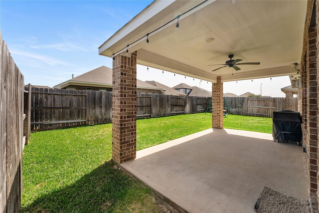 21718 Rose Maris Ln, Tomball, TX 77377 - view of patio / terrace with a fenced backyard, a grill, and a ceiling fan