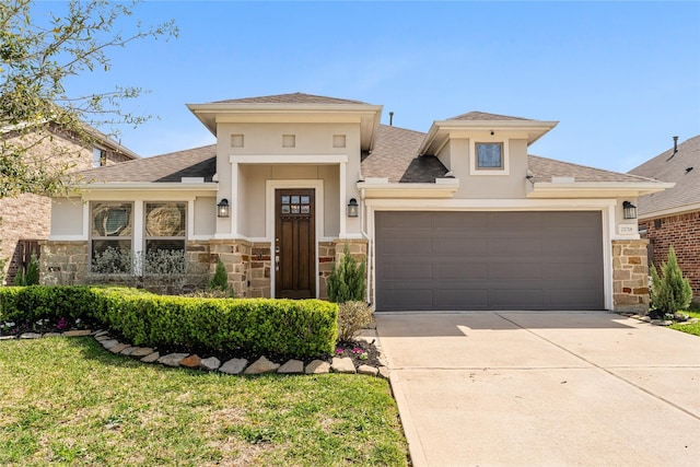 21718 Rose Maris Ln, Tomball, TX 77377 - prairie-style house with concrete driveway, stone siding, a garage, and stucco siding