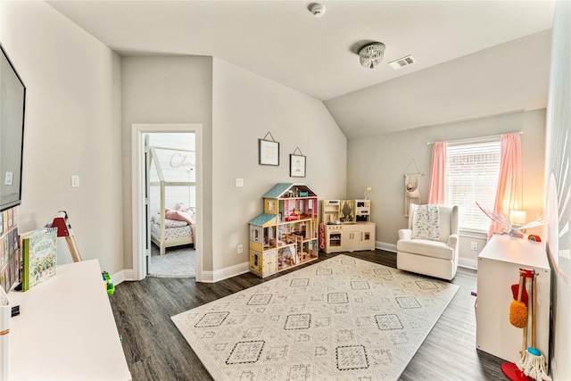 21718 Rose Maris Ln, Tomball, TX 77377 - rec room with visible vents, baseboards, lofted ceiling, and dark wood-style floors