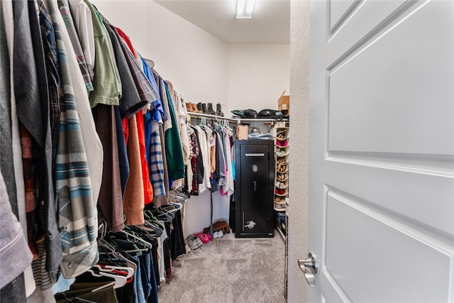 21718 Rose Maris Ln, Tomball, TX 77377 - walk in closet with carpet flooring