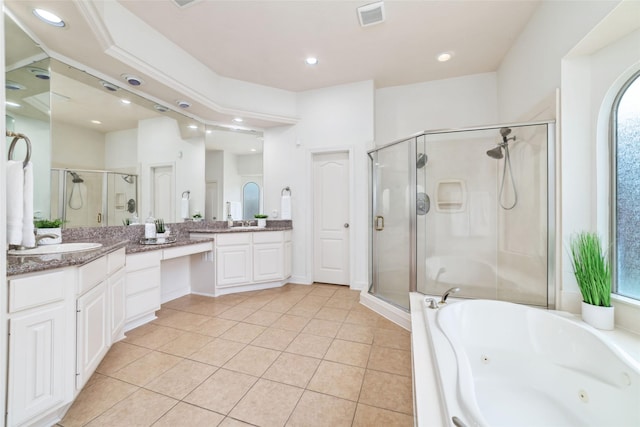 bathroom with vanity, recessed lighting, a jetted tub, and a stall shower