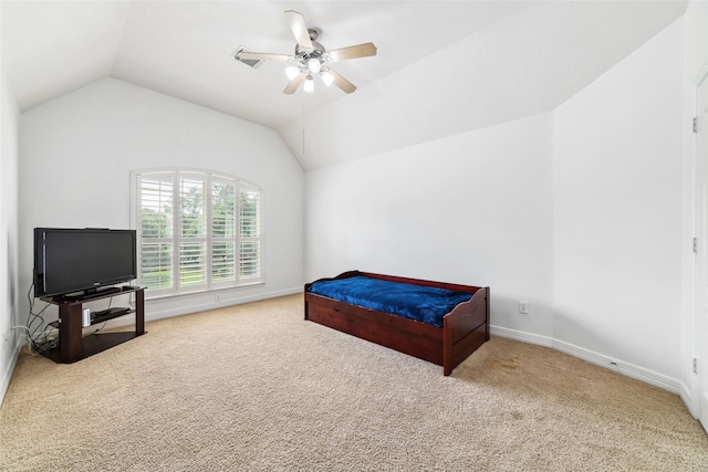 carpeted bedroom featuring baseboards, a ceiling fan, and lofted ceiling