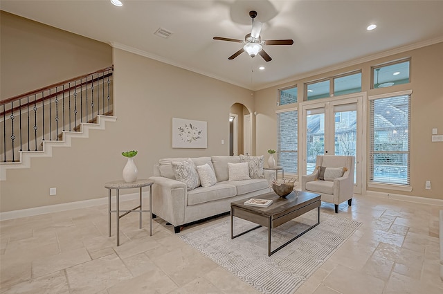 3215 Wimberly Place Ln, Katy, TX 77494 - living room featuring ornamental molding, arched walkways, recessed lighting, ceiling fan, and baseboards