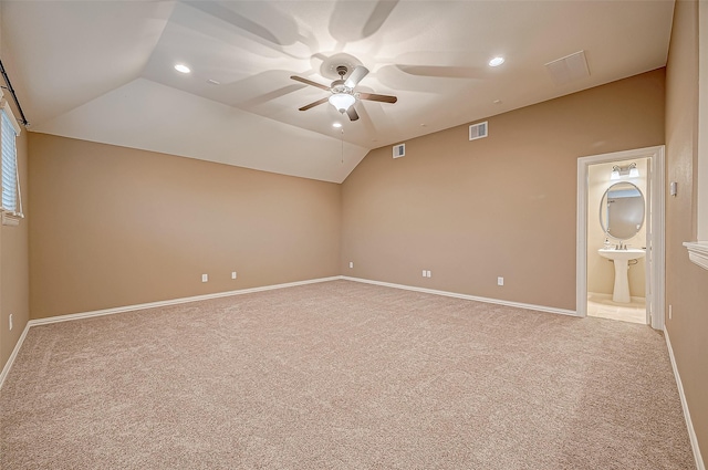 3215 Wimberly Place Ln, Katy, TX 77494 - carpeted empty room featuring a ceiling fan, recessed lighting, lofted ceiling, baseboards, and a sink