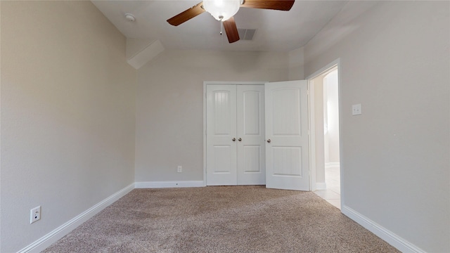 2135 Llerena Ln, League City, TX 77573 - unfurnished bedroom featuring carpet flooring, a closet, ceiling fan, and baseboards