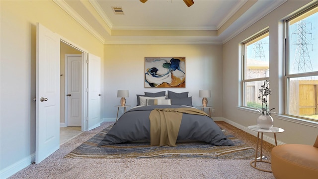 2135 Llerena Ln, League City, TX 77573 - carpeted bedroom with a tray ceiling, ornamental molding, and baseboards