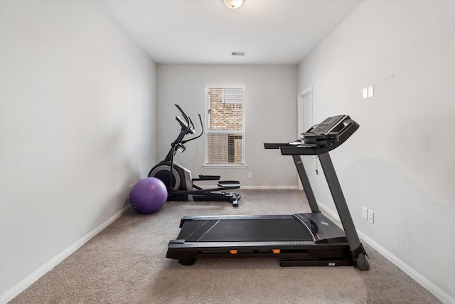 4430 Painted Bunting Ln, Baytown, TX 77521 - workout area featuring visible vents, baseboards, and carpet