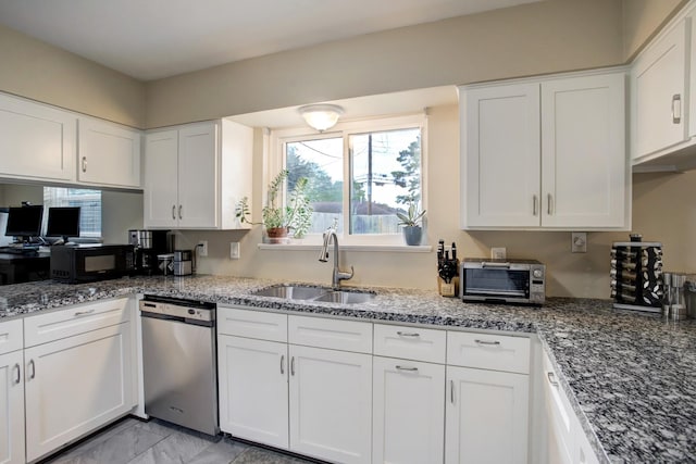 5522 Duxbury St, Houston, TX 77035 - kitchen with dishwasher, black microwave, a sink, white cabinetry, and stone countertops