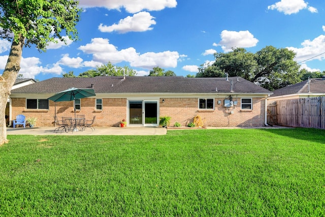 5522 Duxbury St, Houston, TX 77035 - rear view of property featuring a patio and brick siding