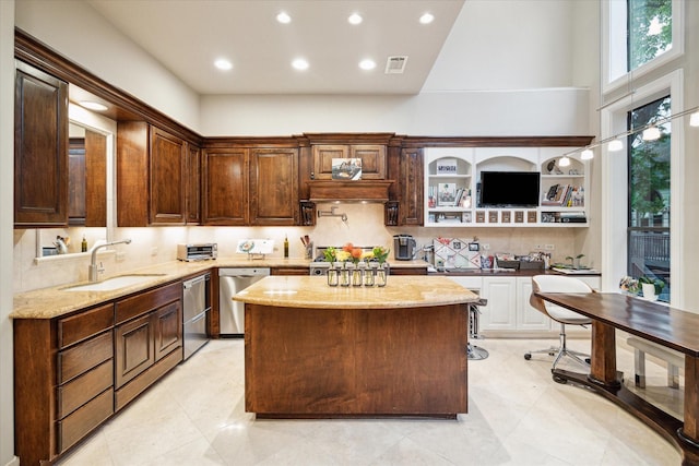 kitchen featuring light stone countertops, visible vents, recessed lighting, dishwasher, and a sink