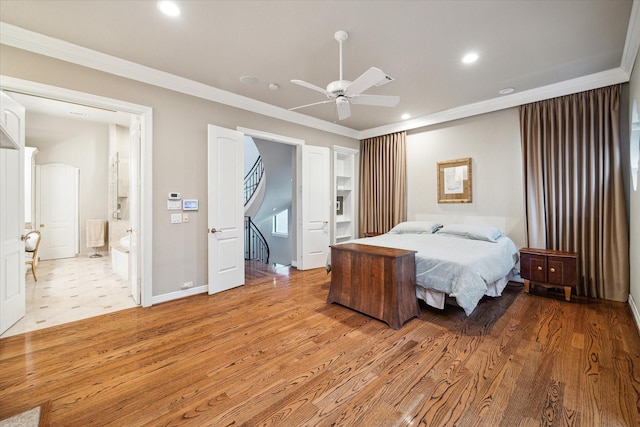 bedroom with recessed lighting, light wood finished floors, baseboards, and crown molding