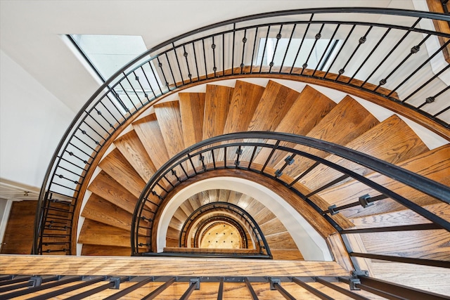 staircase with a skylight